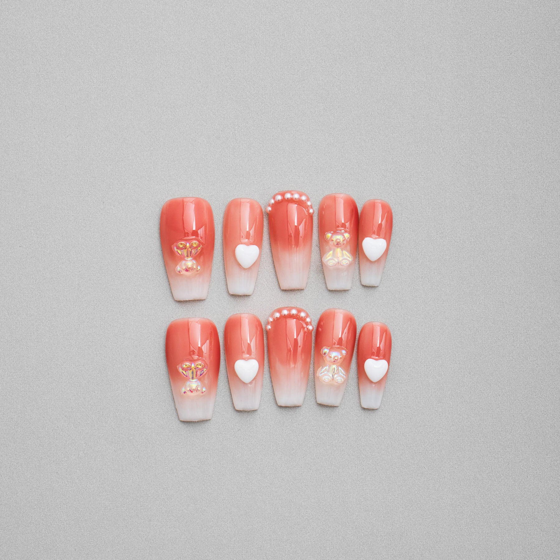 Veloria Beauty "Bear-y Sweet" Coffin Shaped Handmade Press On Nails - Featuring soft white and nude-pink hues with charming hearts and adorable gummy bears for a playful and whimsical look