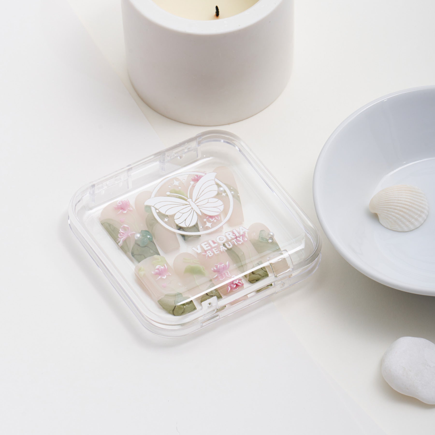 Veloria Beauty "Enchanted Garden Gala" Coffin Shaped Handmade Press On Nails - Featuring a green hue with delicate pink flowers and lustrous pearls, designed to add whimsical elegance to any look