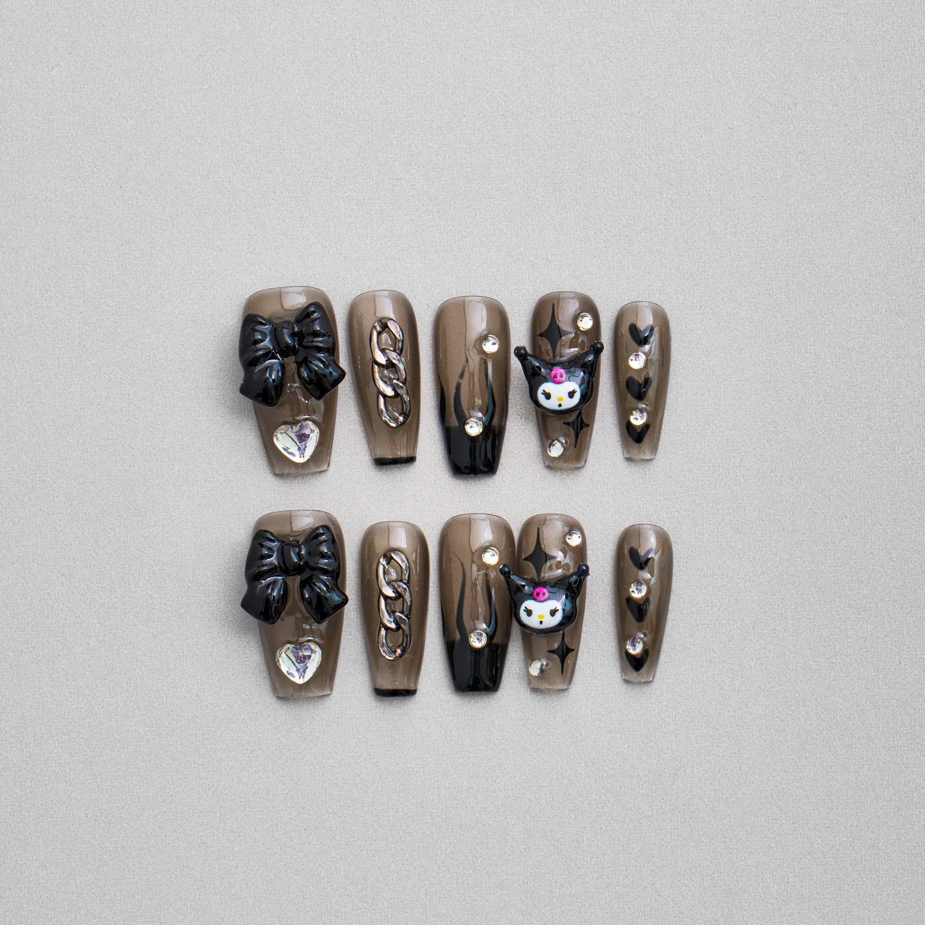 Veloria Beauty "Dark Diva" Coffin Shaped Handmade Press On Nails - Featuring bold bowties, daring chains, and sparkling rhinestones, embodying punky attitude and nocturnal allure