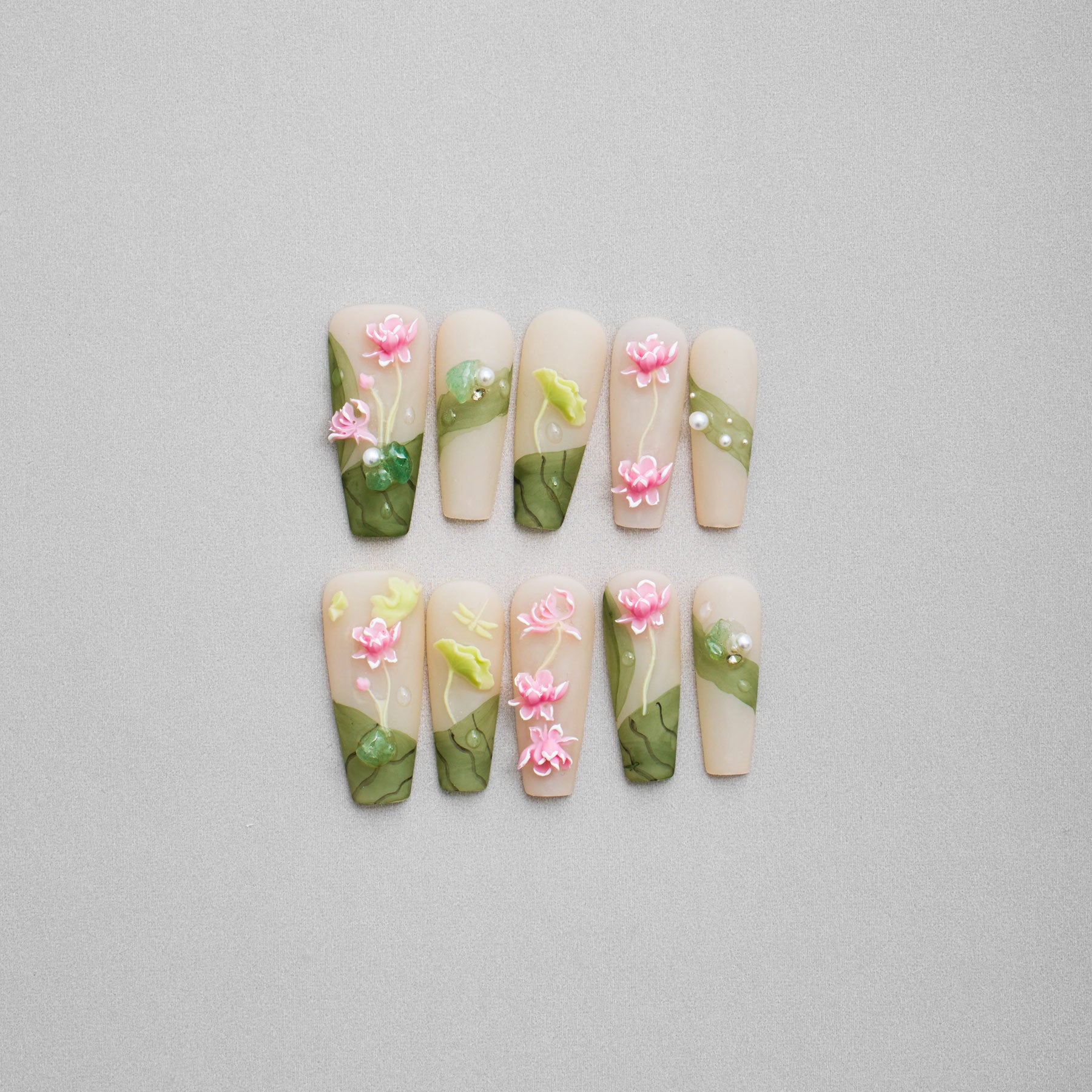 Veloria Beauty "Enchanted Garden Gala" Coffin Shaped Handmade Press On Nails -  Featuring a green hue with delicate pink flowers and lustrous pearls, designed to add whimsical elegance to any look